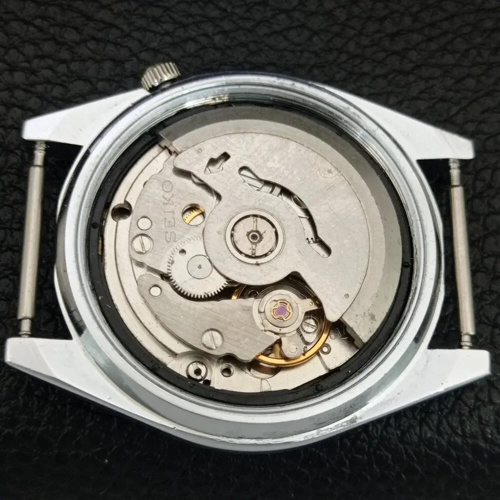 Vintage 1981 Seiko Automatic Mens Silver Watch W/daydate & White accents